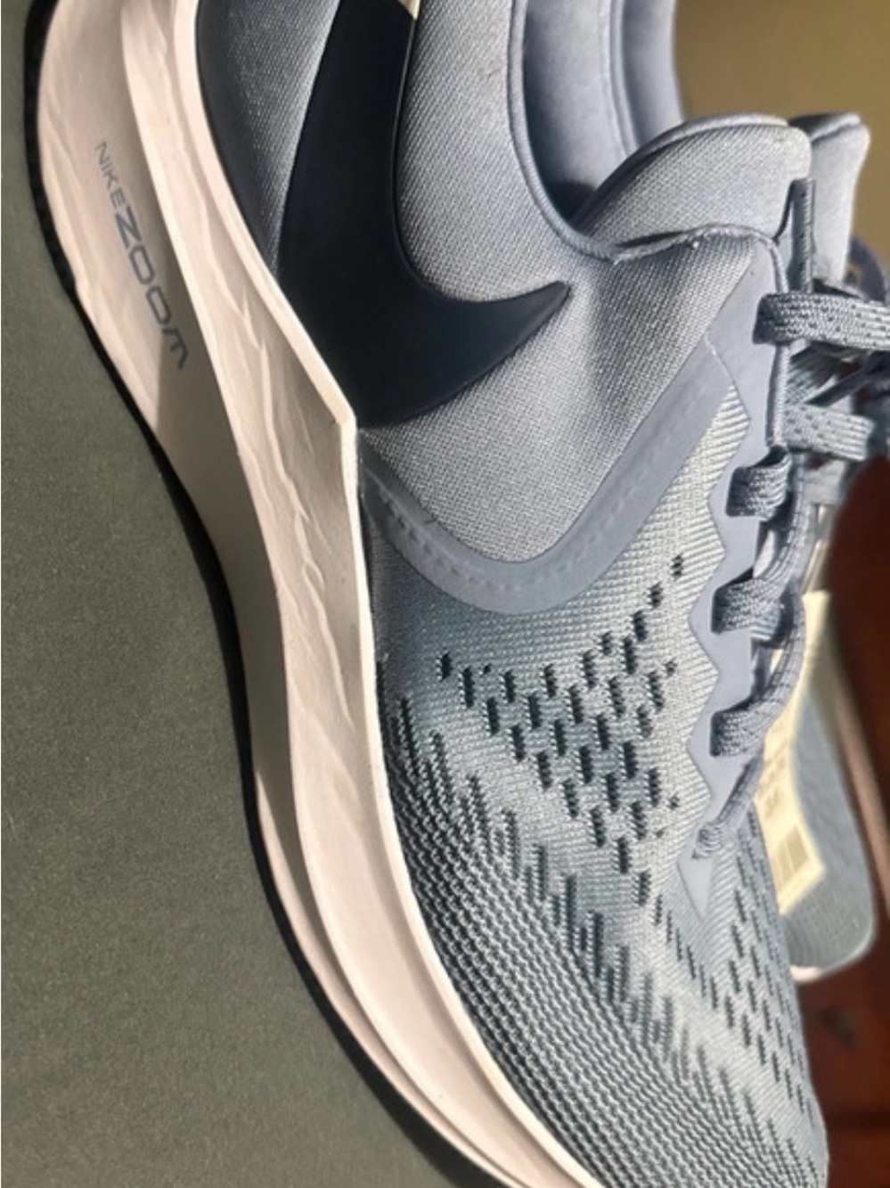 Nike Women’s Light Blue and White Running Sneakers